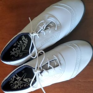 Callaway white golf shoes.  Size 6.5 like new